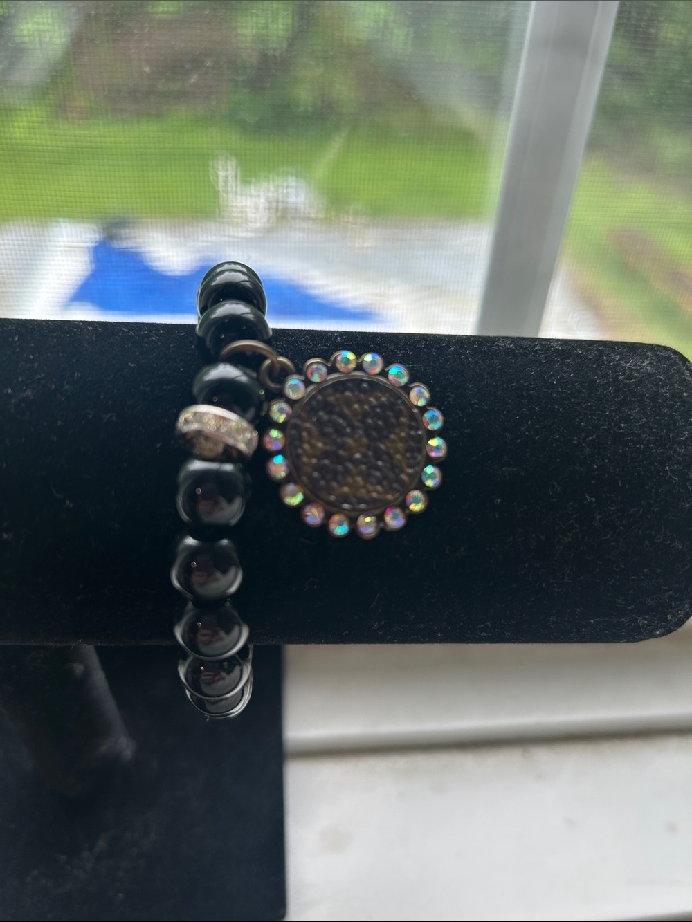 Keep It Gypsy Upcycled LV Quatrefoil Crystal embellished charm bracelet.